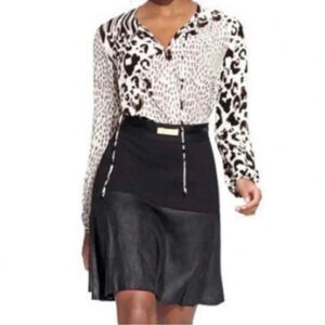 CAbi “Owens”black flared skirt (548). XS